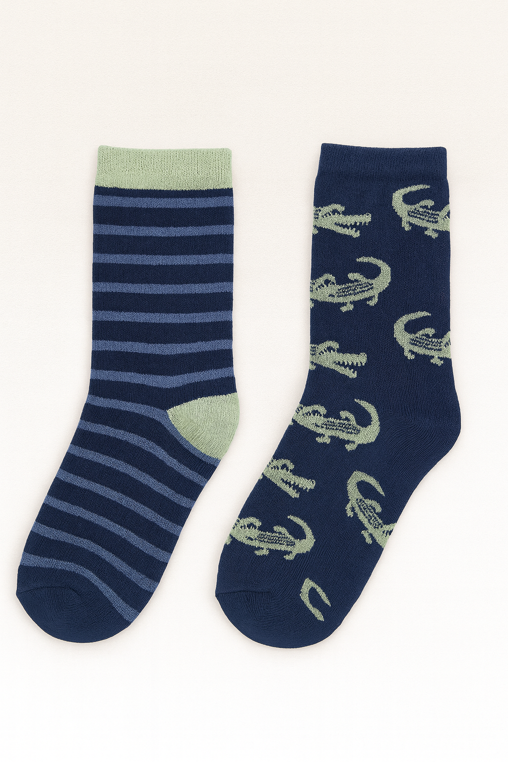 Two pairs of socks, one striped and one with alligator pattern
